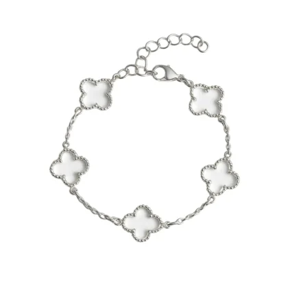 Pulsera de acero blanco con dijes trébol calados – Numena Joyas